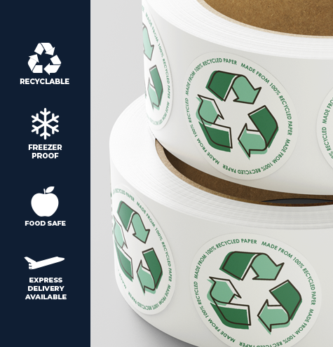 A roll of circular labels printed on recycled paper material. 